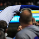 Illustration for article titled Anthony Rizzo Climbs Onto Tarp To Make Phenomenal Catch